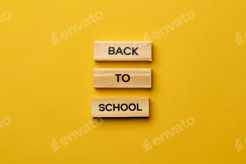 Preview: a yellow warm background without shadows wooden cubes with black letters laid out word back to