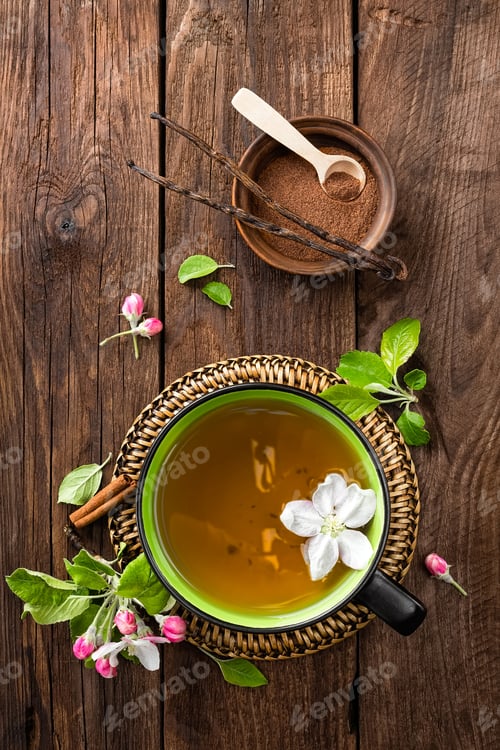 Wooden Table with Herbal Tea and Spices