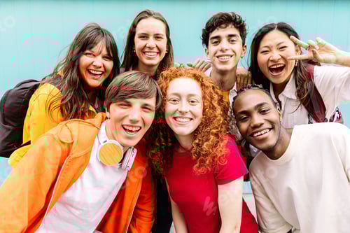 Preview: Diverse group of teenage student friends standing together over blue background
