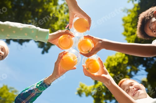 Preview: Kids Cheering with Orange Juice