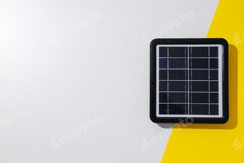 Preview: Solar panel on white and yellow background, space for text