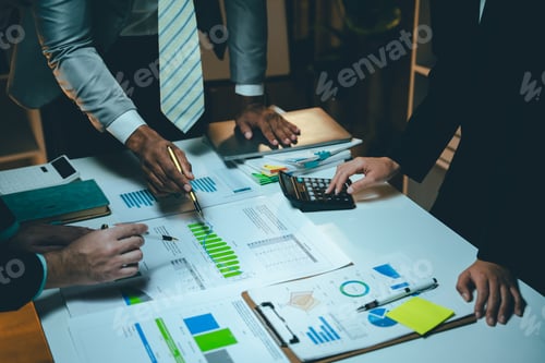 Preview: Business people meeting overtime, brainstorming, discussing, analyzing and planning business strateg