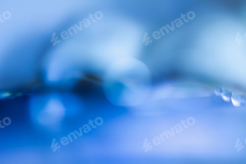 Preview: Blue bokeh. Abstract background. Defocused lights.