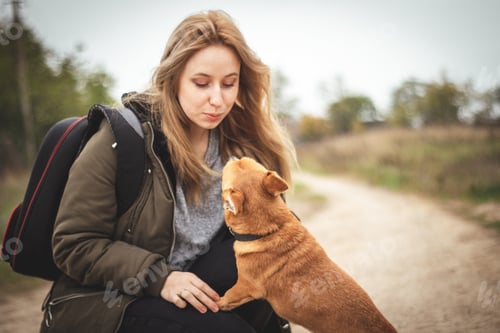 Preview: Woman with Dog in Rural Setting Outdoors