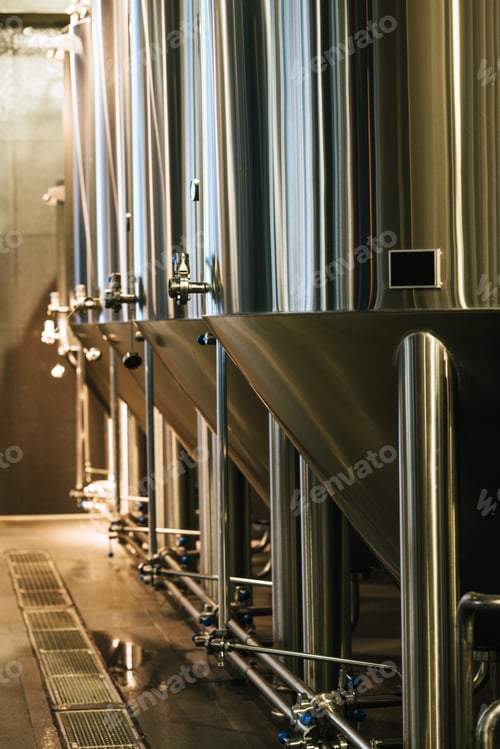 Preview: Modern brewery equipment with stainless tanks for the fermentation beer