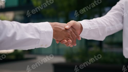 Preview: Close up business partners hands handshake businesspeople deal successful agreement cooperation team