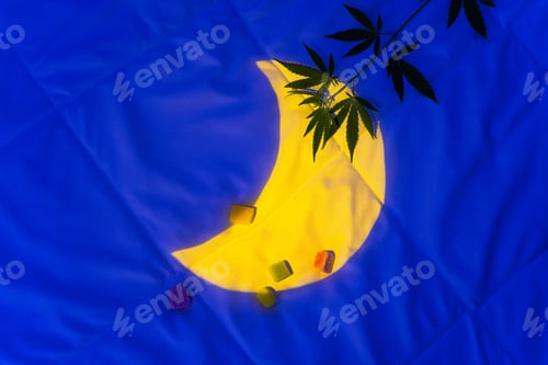 Preview: Evening bedroom with cannabidiol gummies, marmalade and hemp branch