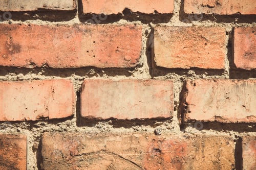 Preview: Closeup of old brick wall as background texture. Vintage photo