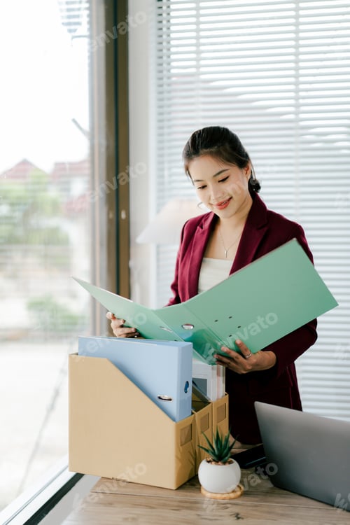 Preview: Female secretary holding file searching for documents in office. Young woman checking business