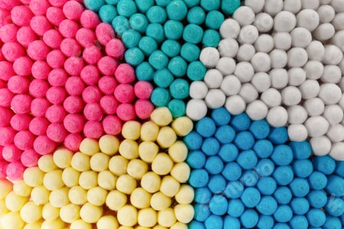 Preview: Background of multi-colored cotton swabs, sticks, buds. Macro shot.