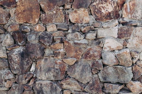 Preview: Background of old worn stone wall texture.