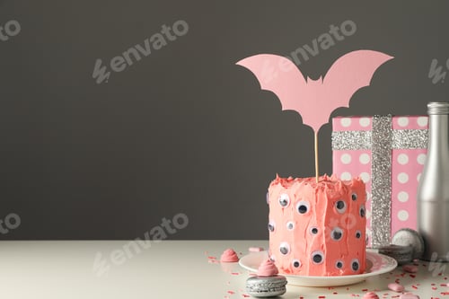 Preview: A festive table with a cake for the Halloween holiday