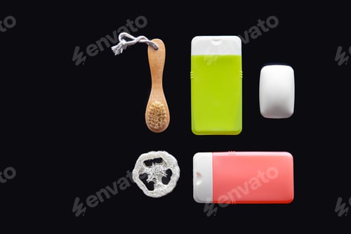 Preview: Flat lay spa composition with skin care products on black background.