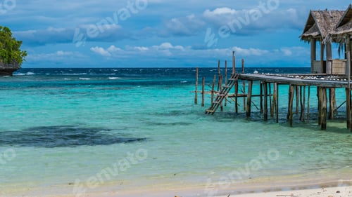 Preview: Beautiful Blue Lagoone with some Bamboo Huts, Kordiris Homestay, Palmtree in Front, Gam Island, West