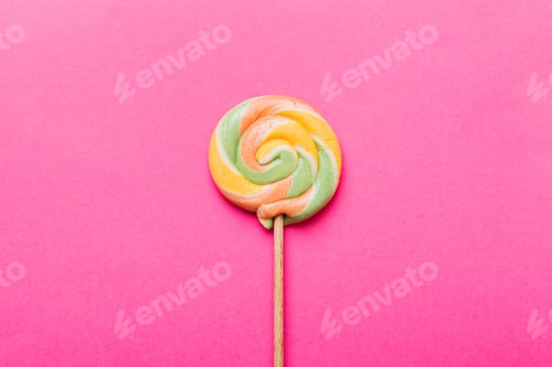Preview: Colorful candies, lollypop on the colorful background, multicolored minimal style top view
