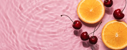 Preview: Oranges and cherries in pink water banner with concentric circles and ripples. Refreshing summer con