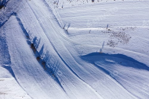 Preview: Aerial drone view of nature snow patterns and background