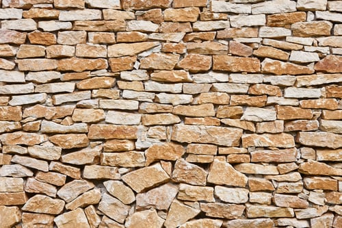 Preview: Stone textured wall in brown color. Natural rocky background. Horizontal