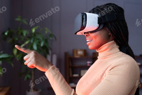 Preview: Woman in vr headset touch object in virtual reality. Girl in goggles interact in digital interface