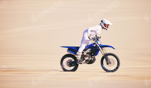 Preview: Race, motorbike and person in desert, action and extreme sport with speed, riding outdoor and mocku