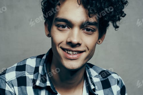 Preview: cute guy number shirt fun hair curly hair close up