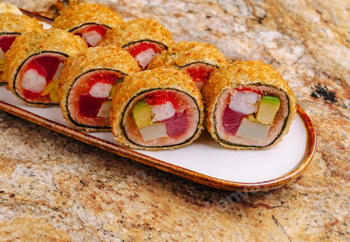 Preview: Delicious sushi rolls served on a plate at a local restaurant