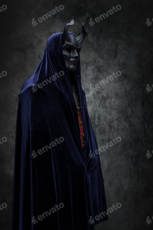 Preview: Evil cultist with dark cloak against dark background