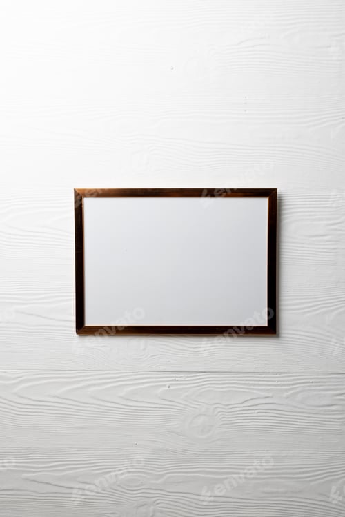 Preview: Vertical of empty brown frame with copy space on white wall