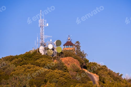 Preview: Telecommunications antennas at sunset