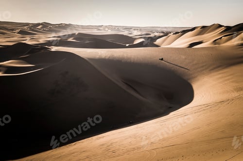 Preview: Dune buggying in sand dunes at sunset in the desert at Huacachina, Ica Region, Peru, South America