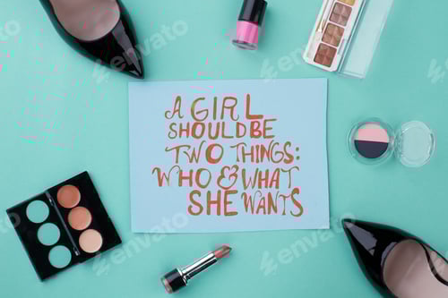 Preview: Girl's accessories on turquoise background.