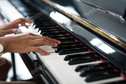 Preview: Woman playing on a piano