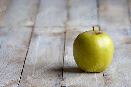 Preview: Ripe Apple on Rustic Wooden Surface