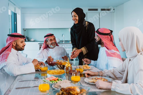 Preview: Arab family enjoying traditional meal together during ramadan