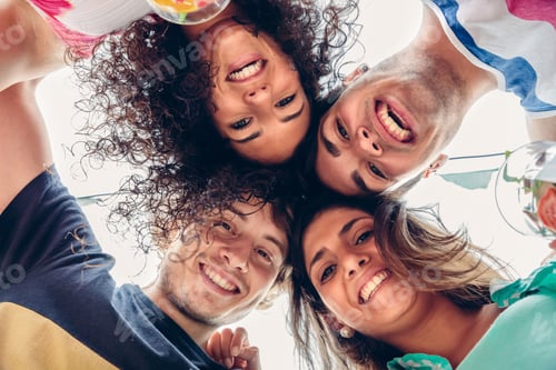 Preview: Young people with their heads together having fun