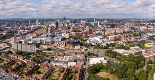 Preview: Aerial view of a Birmingham cityscape skyline with HS2 construction site
