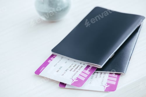 Preview: close up of passports with tickets on desk