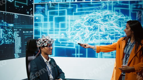 Preview: Presenter at AI convention showing EEH headset demonstration
