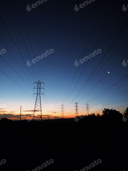 Preview: Sunset with Silhouetted Power Lines and Crescent Moon.