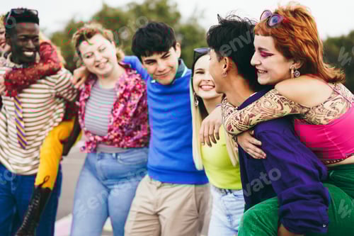 Preview: Happy diverse friends having fun together outdoor - Focus on asian man ear