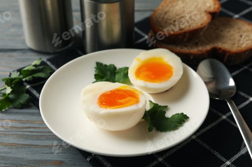 Preview: Concept of breakfast with boiled eggs on wooden background