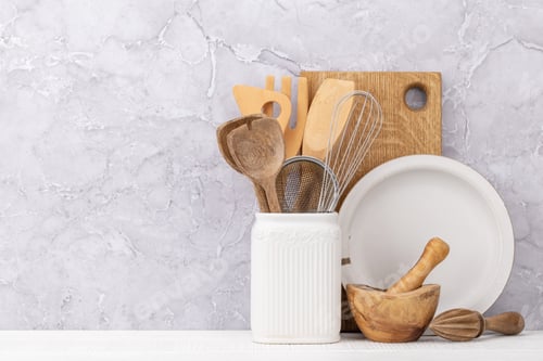 Preview: Kitchen utensils on wooden table