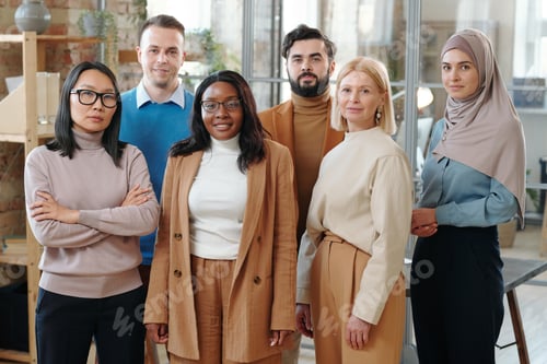 Preview: Large group of hr managers in formalwear standing in row