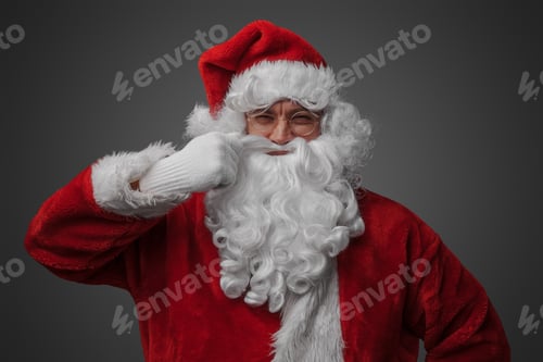 Preview: Xmas santa stroking his moustache against gray background