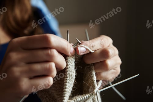 Preview: Hands Knitting Warm Wool Garment with Needles