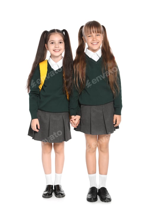Preview: Little girls in stylish school uniform on white background