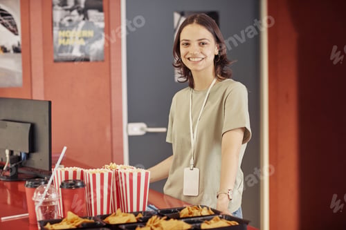 Preview: Seller selling popcorn at cinema