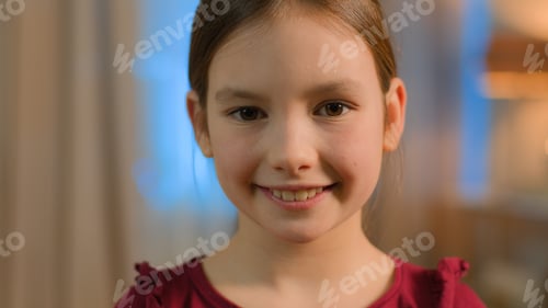 Preview: Close up portrait little Caucasian girl daughter child schoolgirl happy joyful toothy smiling female