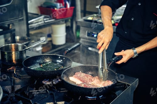 Preview: Cooking meat on stove