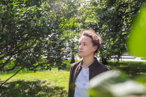 Preview: Portrait of teenage boy (16-17) in park